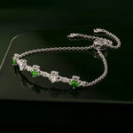 styled image of sterling silver green and white crystal claddagh bracelet from Solvar