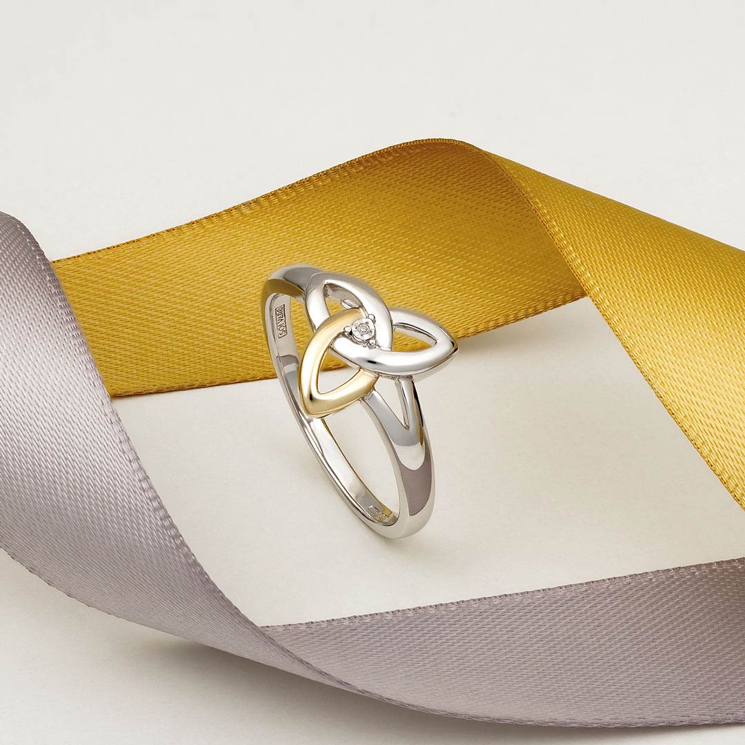 styled image of sterling silver and gold diamond trinity knot ring s2977 from Solvar