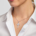 silver history of ireland cross necklace on a model
