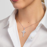silver history of ireland cross necklace on a model