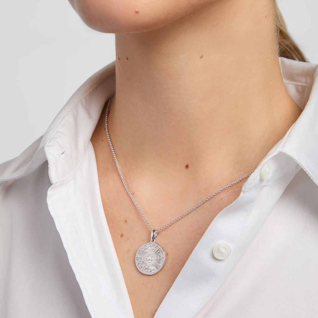 History of Ireland disc pendant on a model