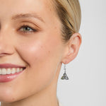 green marble Celtic Trinity Knot drop earrings on a model