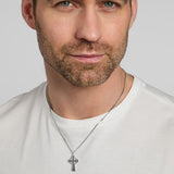 a male model wearing oxidised silver Celtic cross pendant on a heavy chain from Solvar