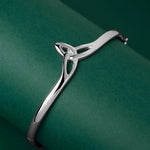 lifestyle image of sterling silver Celtic Trinity Knot bangle from Solvar