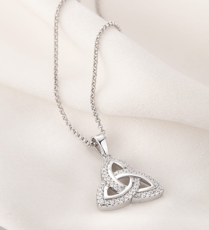 lifestyle image of cz trinity knot necklace s46043 on the light background