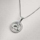 Sterling silver Celtic Trinity Knot pendant surrounded by a halo of sparkling crystals on a polished box chain necklace
