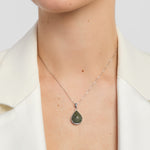 green marble teardrop pendant on a model