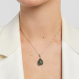 green marble teardrop pendant on a model