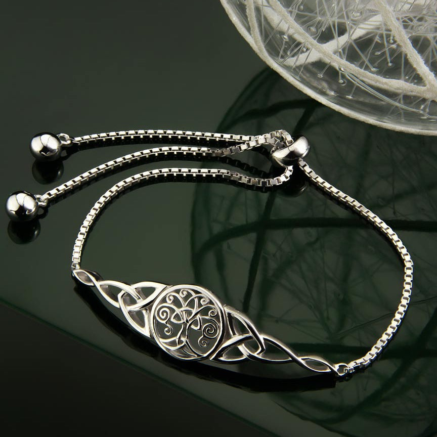 styled image of Celtic tree of life bracelet from Solvar on green background