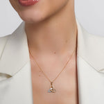 a model wearing yellow gold diamond trinity know pendant s46517