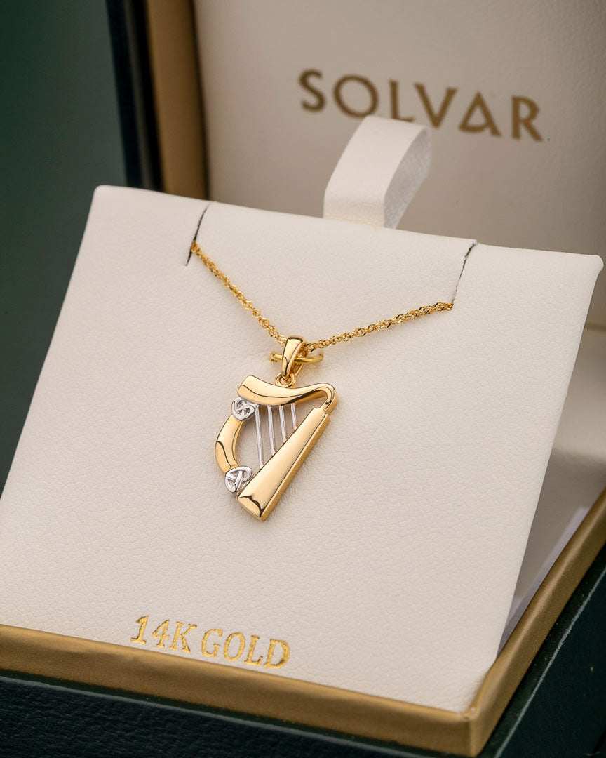 two tone gold harp pendant s44063 in a branded solvar jewellery box