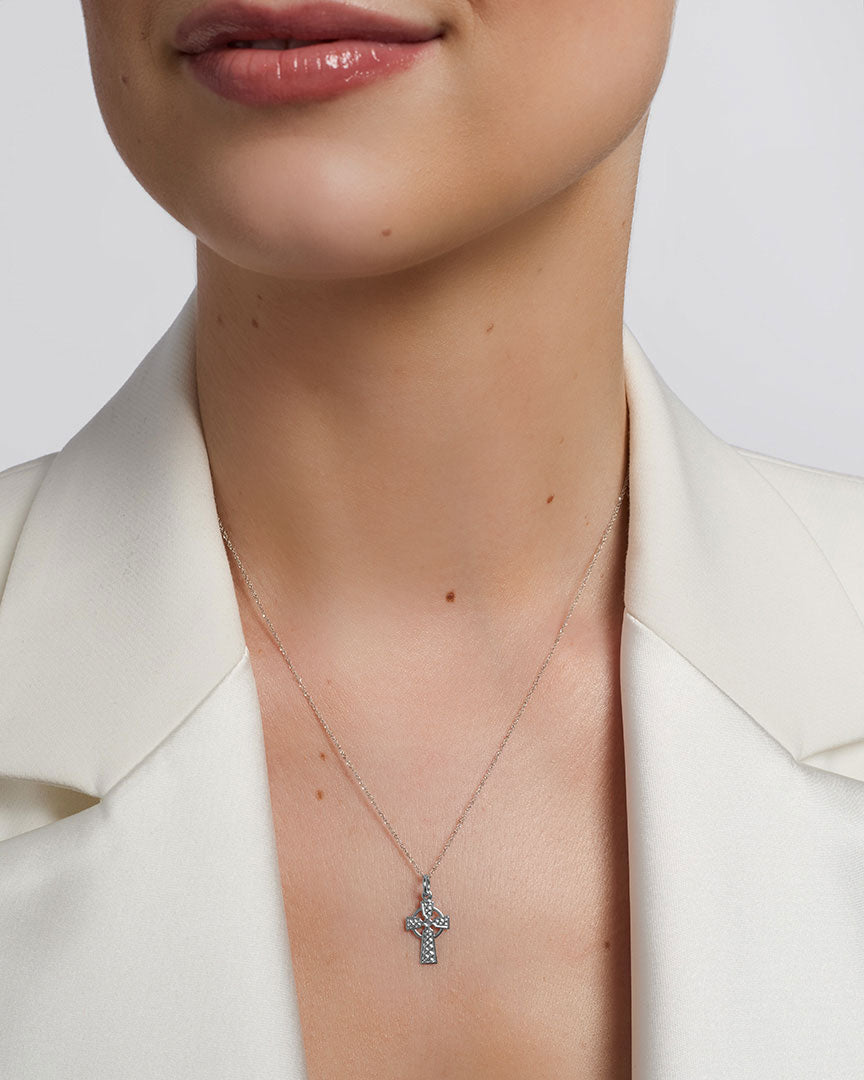 solvar white gold small celtic cross necklace on a model