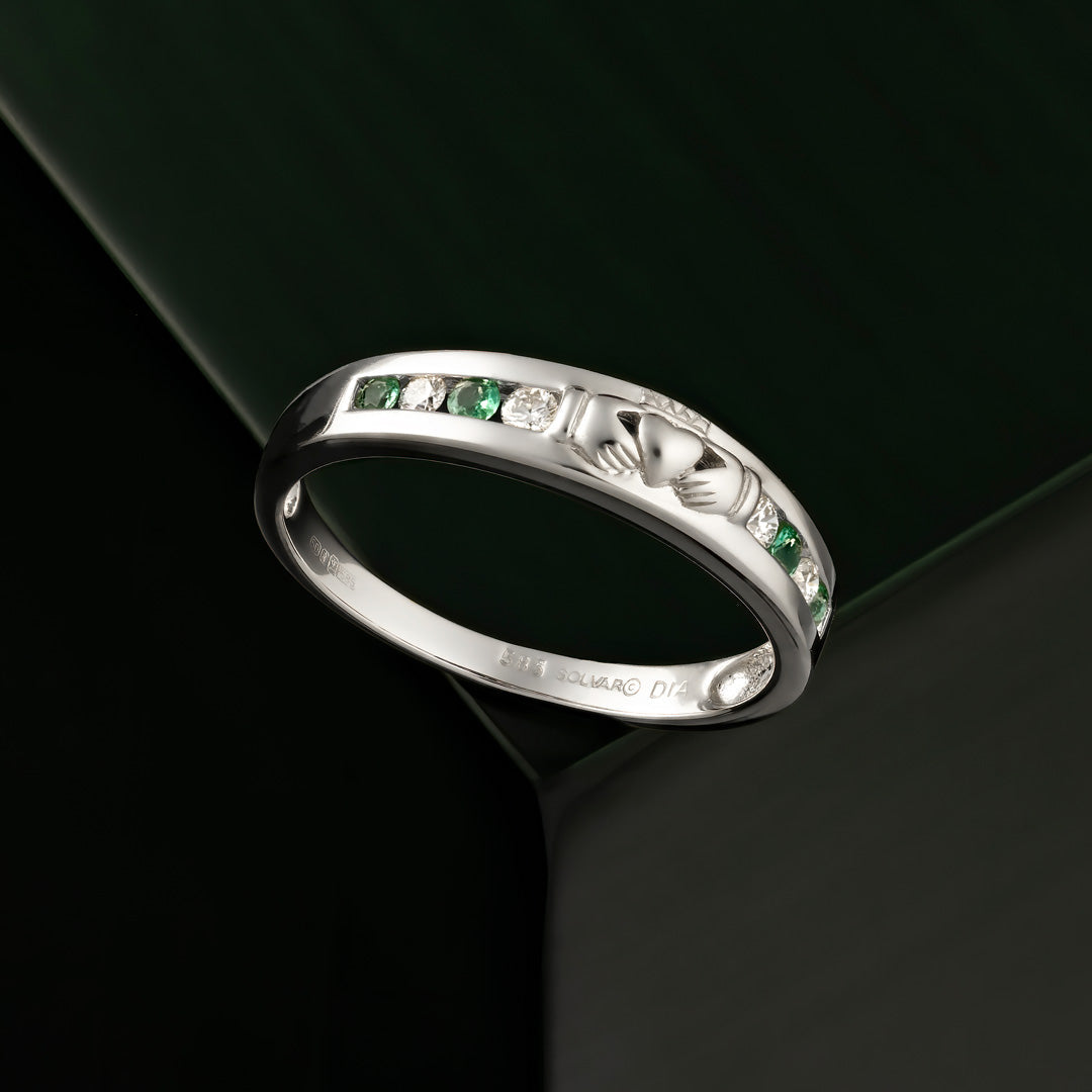 styled image of 14K white gold diamond and emerald claddagh eternity ring s2620 