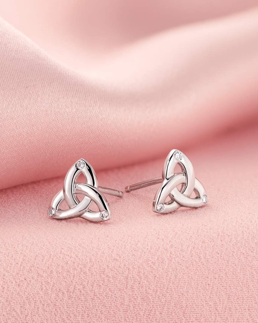 lifestyle image of white gold trinity knot stud earrings s34195