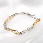 lifestyle image of womens gold and silver celtic bracelet from Solvar